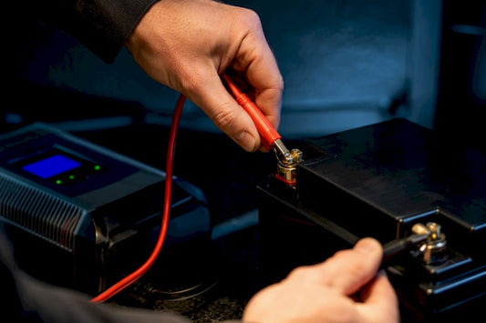 Charger leads connected to lithium battery terminals