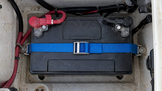 Marine battery secured with a blue restraint